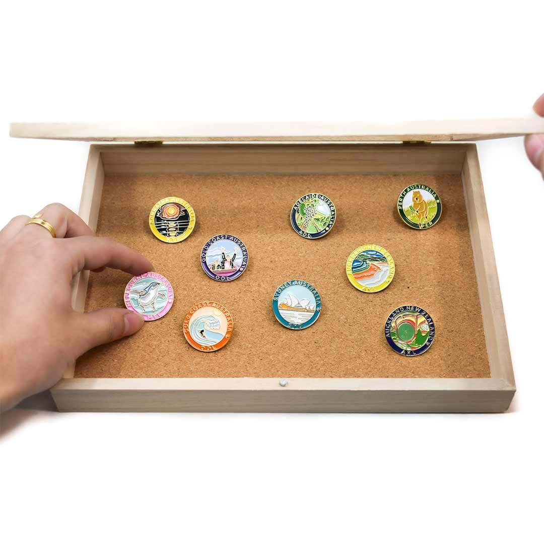 PIn Collection displayed in wooden display box